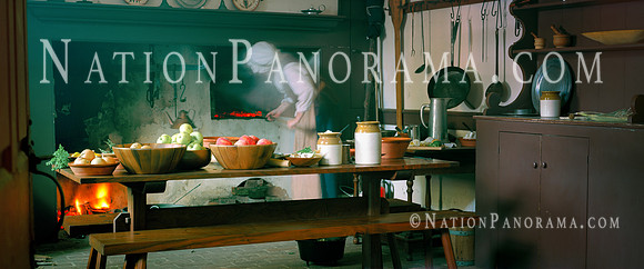 Still Life. Woman  cooking at historic Colonial kitchen