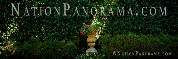 Sun on Stone Flowerpot in a garden