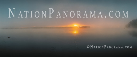Fog at river with sun rising