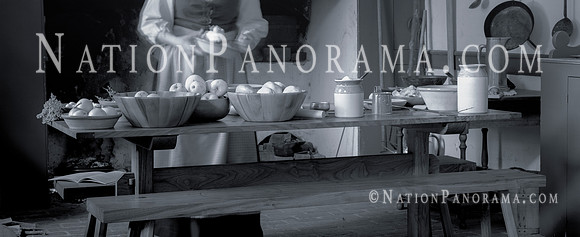 Still Life. Woman  cooking at historic Colonial kitchen
