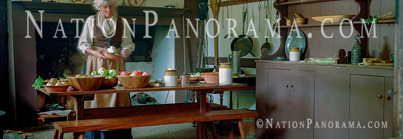 Still Life. Woman  cooking at historic Colonial kitchen