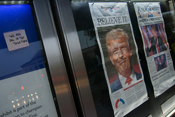 Newspapers with Headlines being put up early morning after elect