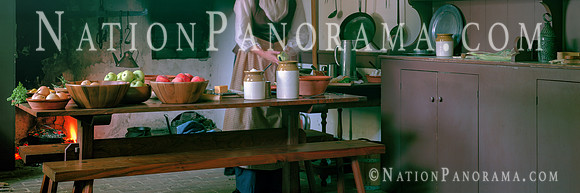 Still Life. Woman  cooking at historic Colonial kitchen