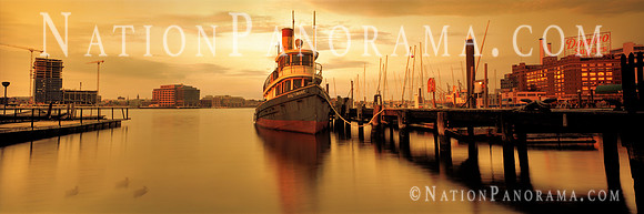 Tug Boat Baltimore with view of Exelon’s Headquarters Building