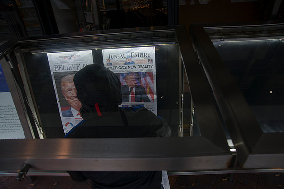 Newspapers with Headlines being put up early morning after elect