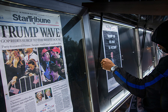 Newspapers with Headlines being put up early morning after elect