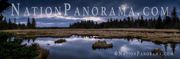 Clouds over marsh. Acadia